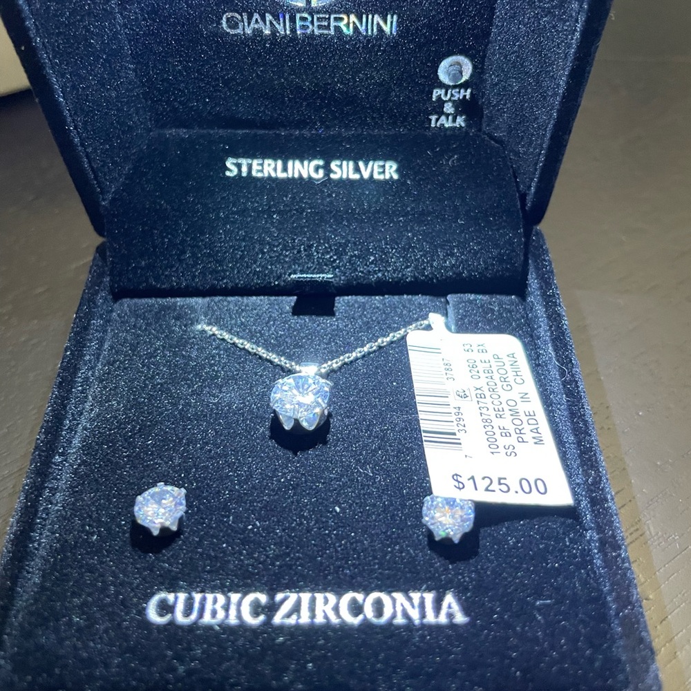 Cubic zirconia matching necklace and earrings.